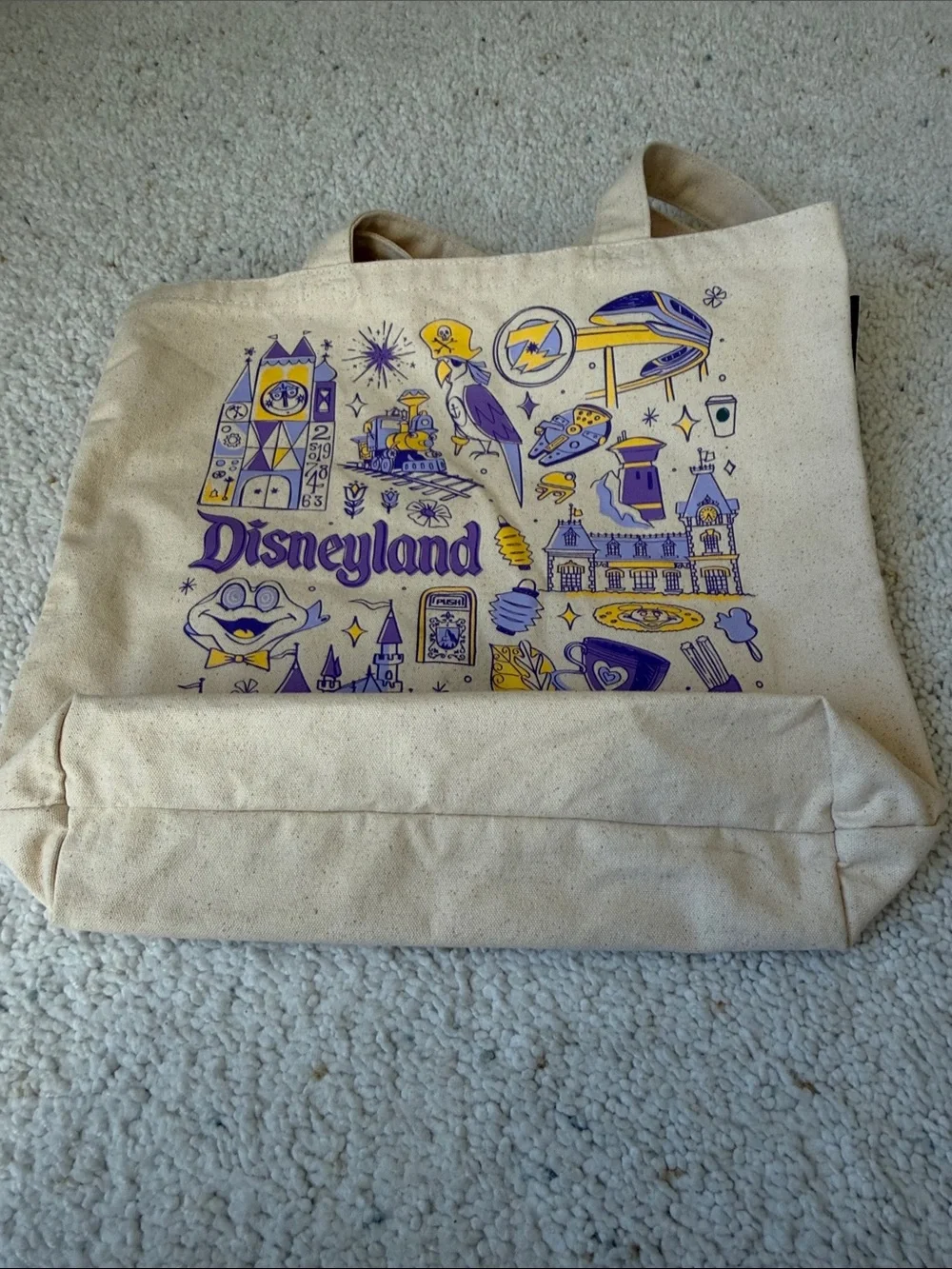 Disneyland X Starbucks Canvas Tote Bag in Cream with Purple & Yellow Graphic